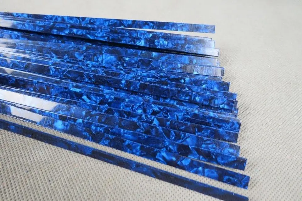 10STRIPS BLUE PEARL SELLULOIDI SIDUV,Measures7mm x1.5mm paks and1600mm pikk